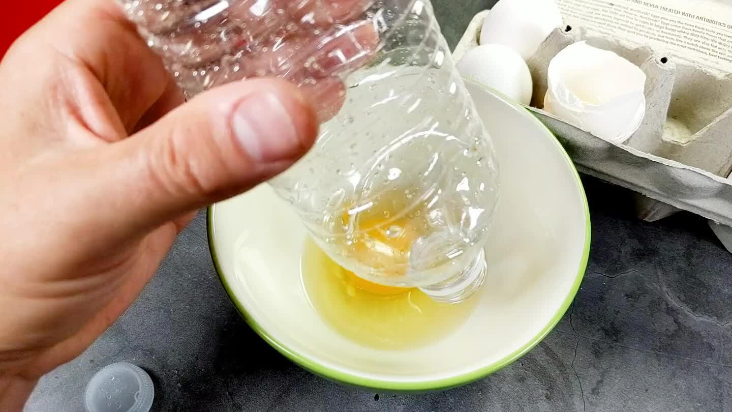 nch. Place the mouth of the bottle against the yolk. Release the bottle slowly. The resulting suction should draw the yolk up into the bottle. Simple and catchy. In practicality, it's a little silly. It's not that fast and it's a little difficult to really get all of the egg white off of the yolk without breaking it. Also, did you wash that water bottle? I have my doubts.