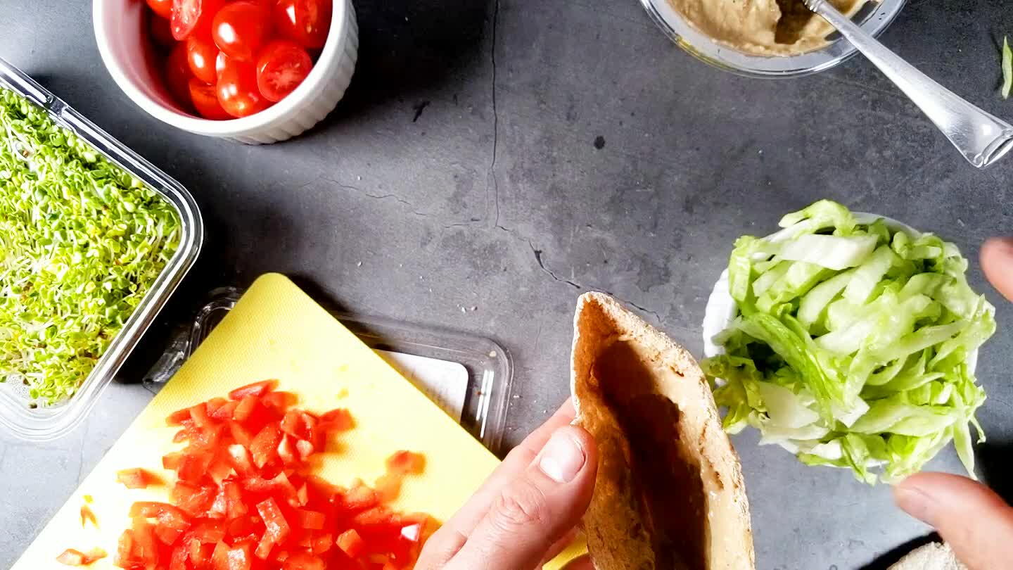 ules on how you layer your pita. I've documented how I built mine, but you'll surely want to mix it up. Add all of the fixins as you like.