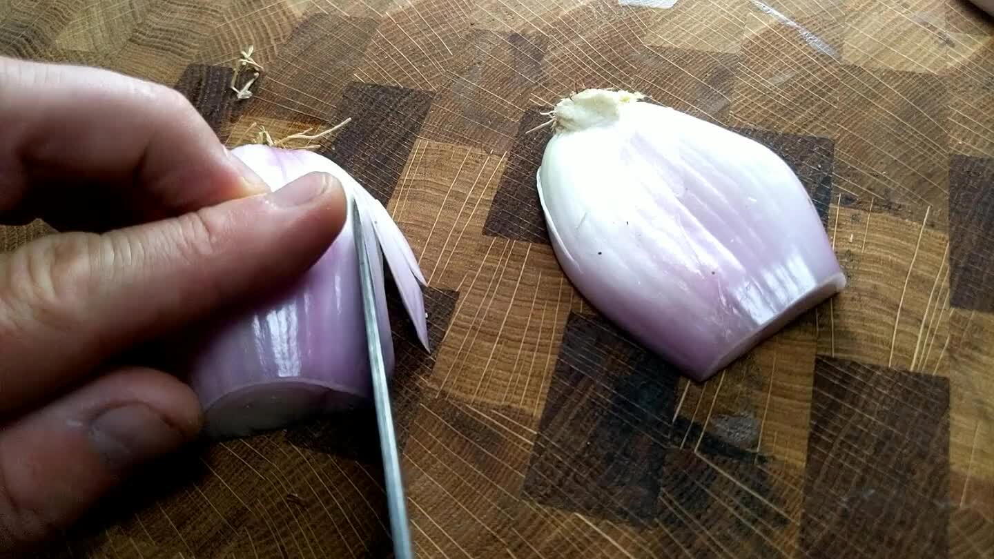 he root side, slice as finely as possible, leaving the slices connected at the root end. That is, don't allow the point of the knife to extend beyond the back of the shallot.