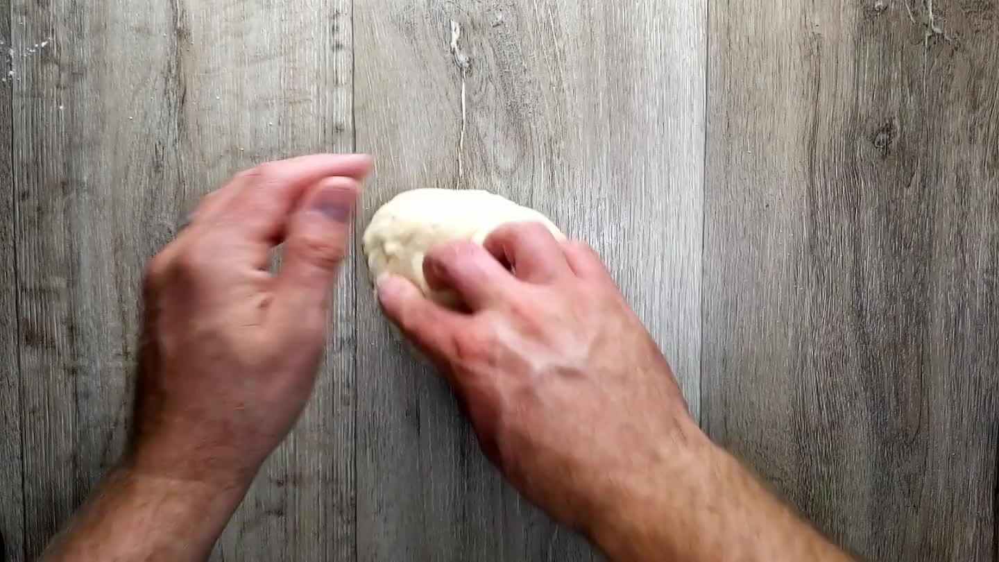 nda fun. Use the heel of your palm to smoosh and spread out the dough into a pancake. Then use the opposite hand to fold the pancake on top of itself and repeat. Do this for a few minutes to develop the dough a little. Make sure to have fun. The dough knows if you're having fun.