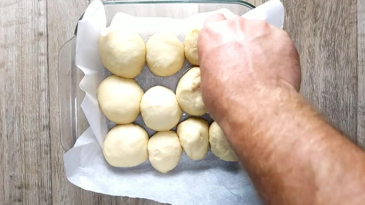 nutes or so. The rolls should again be roughly doubled in volume. Take a look at the video to see how they've grown to fill up all of the extra space in the baking dish. Being all squished together like that will help your rolls stay moist as they bake.