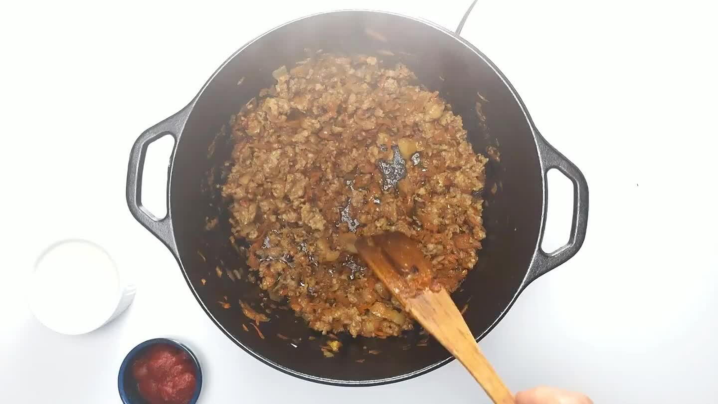 uce the tomato sauce and give it a little color.