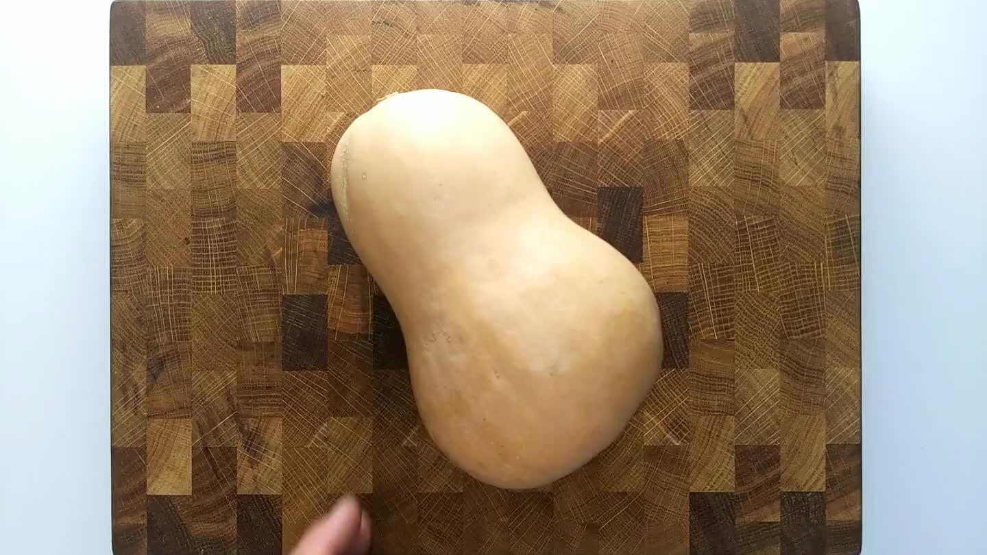 e careful, because butternut squash can be tough to cut in half. Choose a large, heavy knife, and make sure to keep your free hand out of the way.