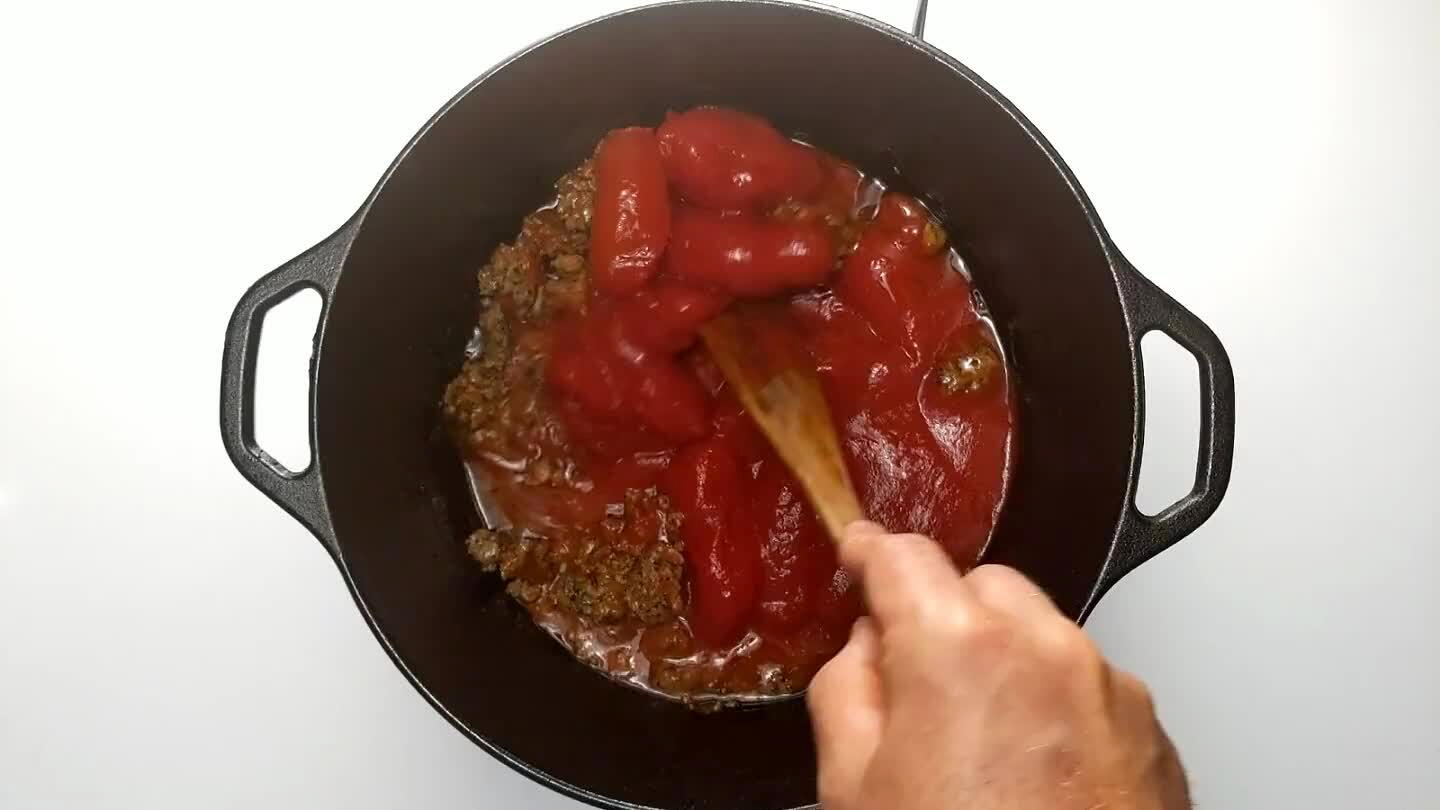 . The tomatoes should be broken down and the sauce thickened slightly. This will probably take about 20-30 minutes depending on your heat and the size of your pan.