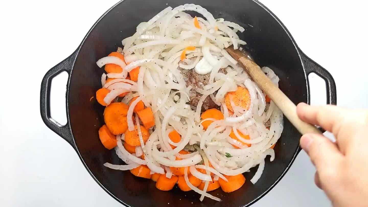 and the meat is submerged. The onions will give off some moisture as they cook and you don't want to completely drown the dish.