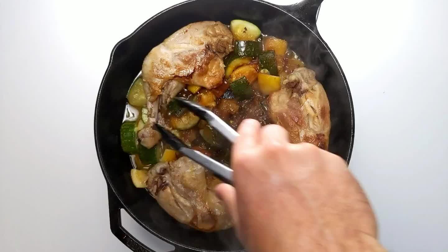almost sticking to the pan. Season and serve. Arrange a chicken leg over a pile of zucchini.