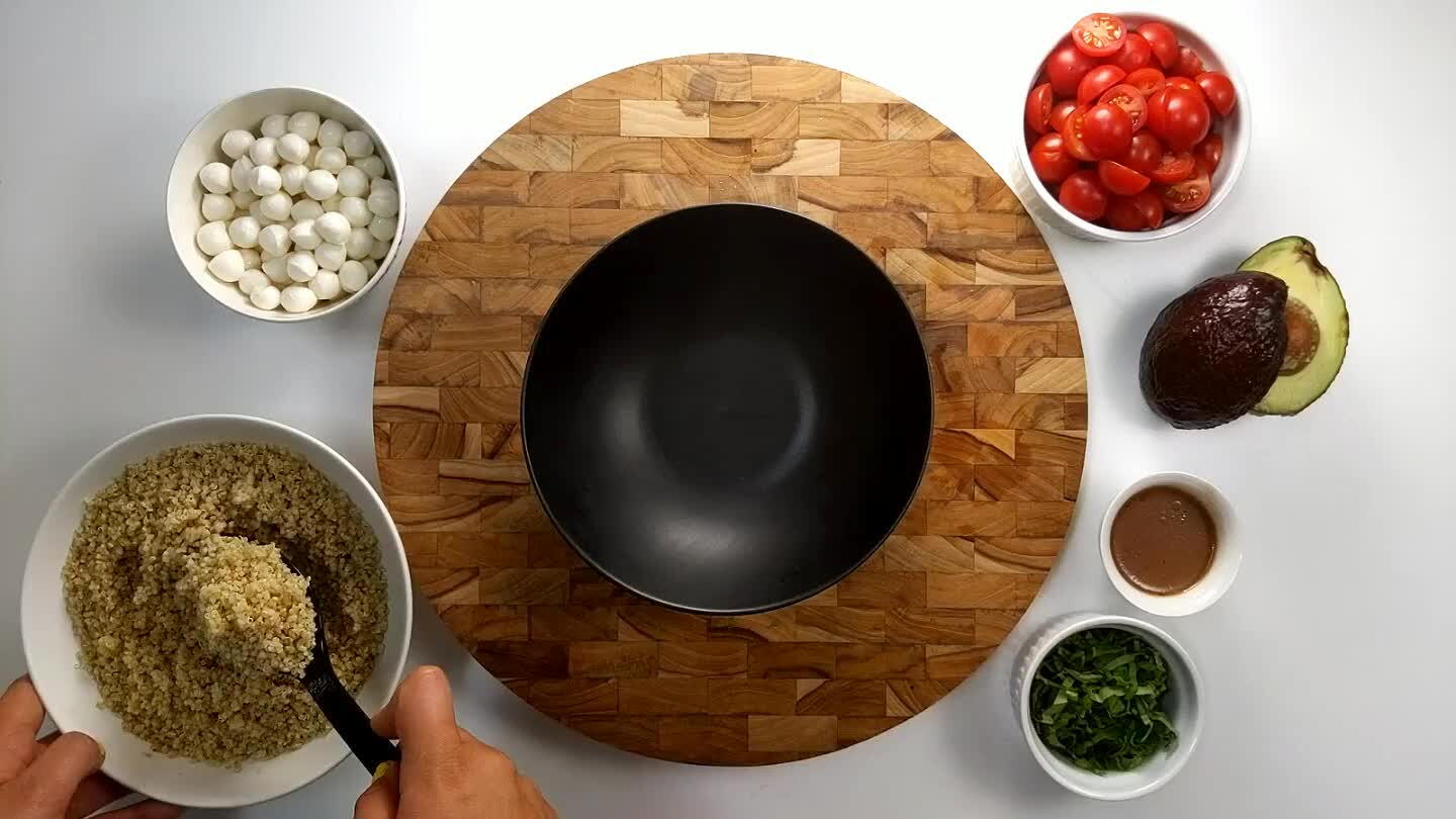 , tomatoes, and other toppings in the bowls.
