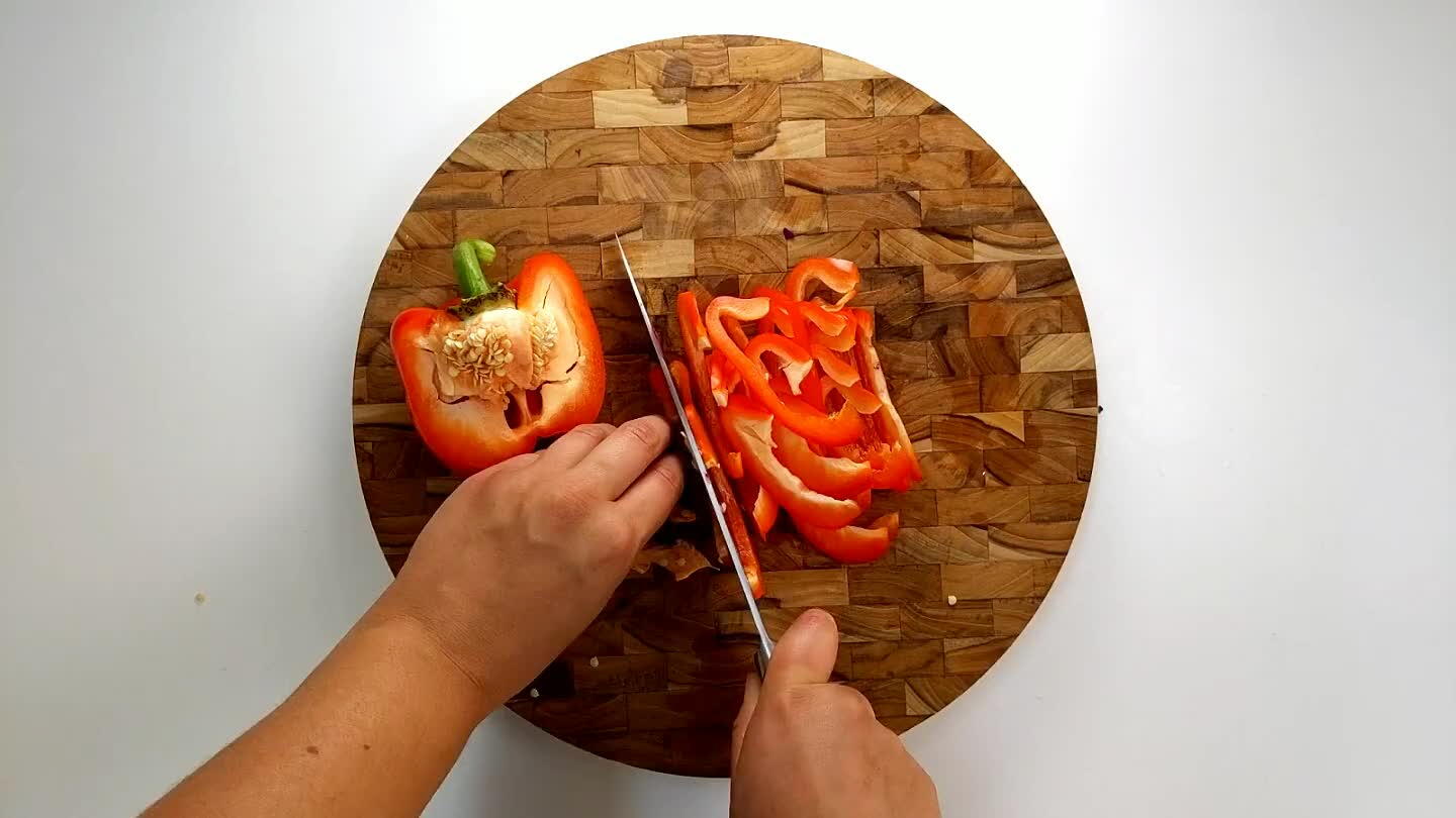 reate thin slices across the pepper and cut those slices in half to make nice bite sized pieces.