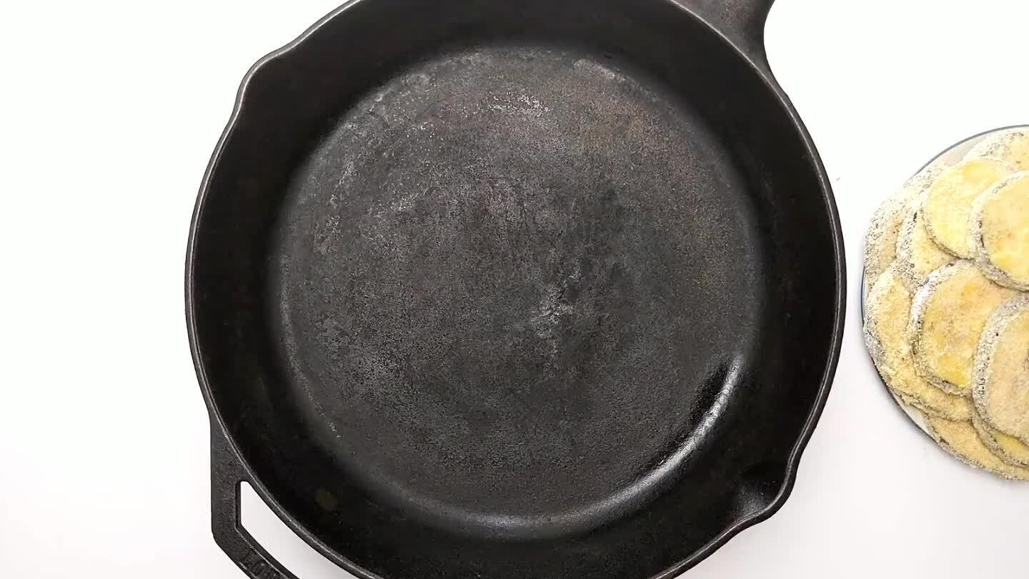 add several slices to the pan. Fry until golden brown, then flip. As each slice is cooked, remove from pan to drain and cook the next slice.