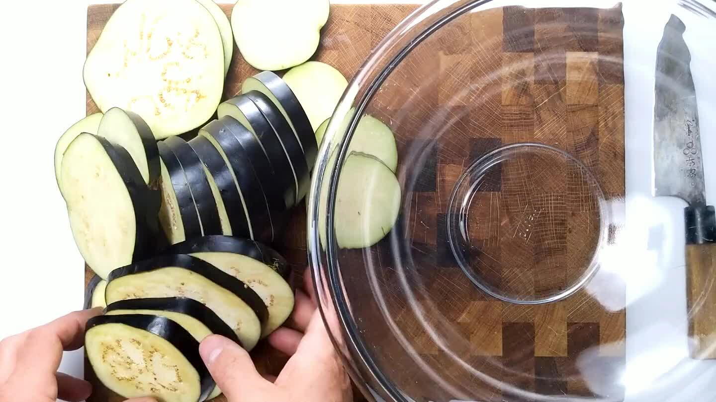 t helps the eggplant release some of its excess moisture. After resting, you should find about 1/2 cup of water in the bottom of the dish.