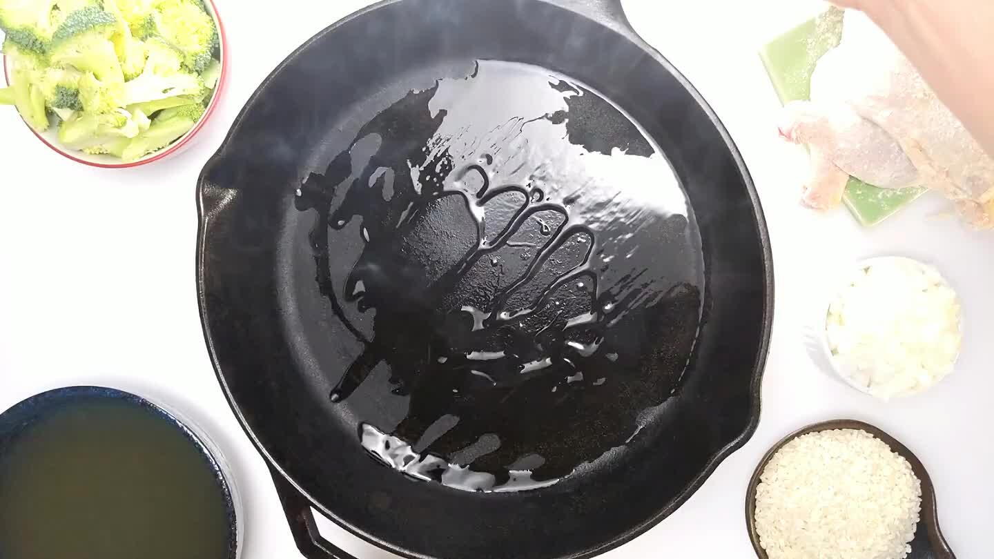 as more skin on the bottom. Brown on both sides. Try not to move the chicken much as it cooks. To check, lift a leg only enough to see that the edge of the skin that is stuck to the pan is browned. When you flip, flip gently, otherwise the skin may tear off.