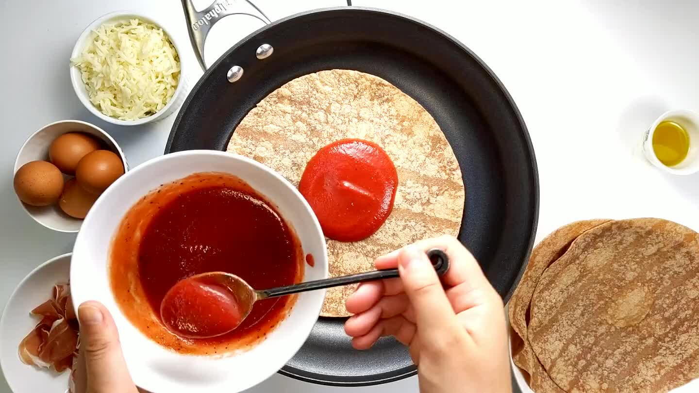 the back of the spoon. Add the mozzarella cheese.
