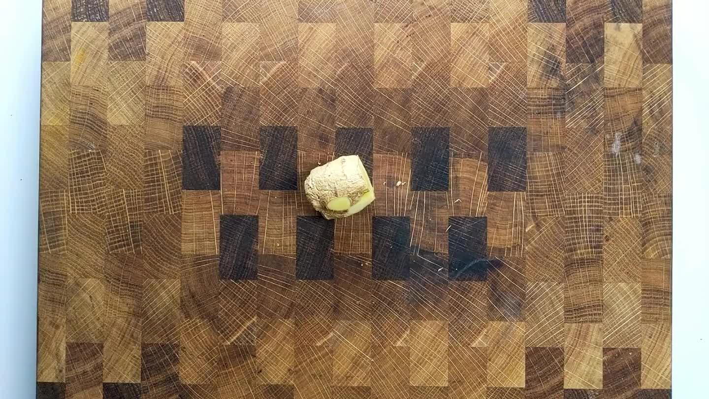 spoon is a great way to get into the little nooks and crannies with ginger root. Grate the ginger to a paste. A ginger grater is ideal, but you can use the fine side of a box grater or just slice the ginger really thin.