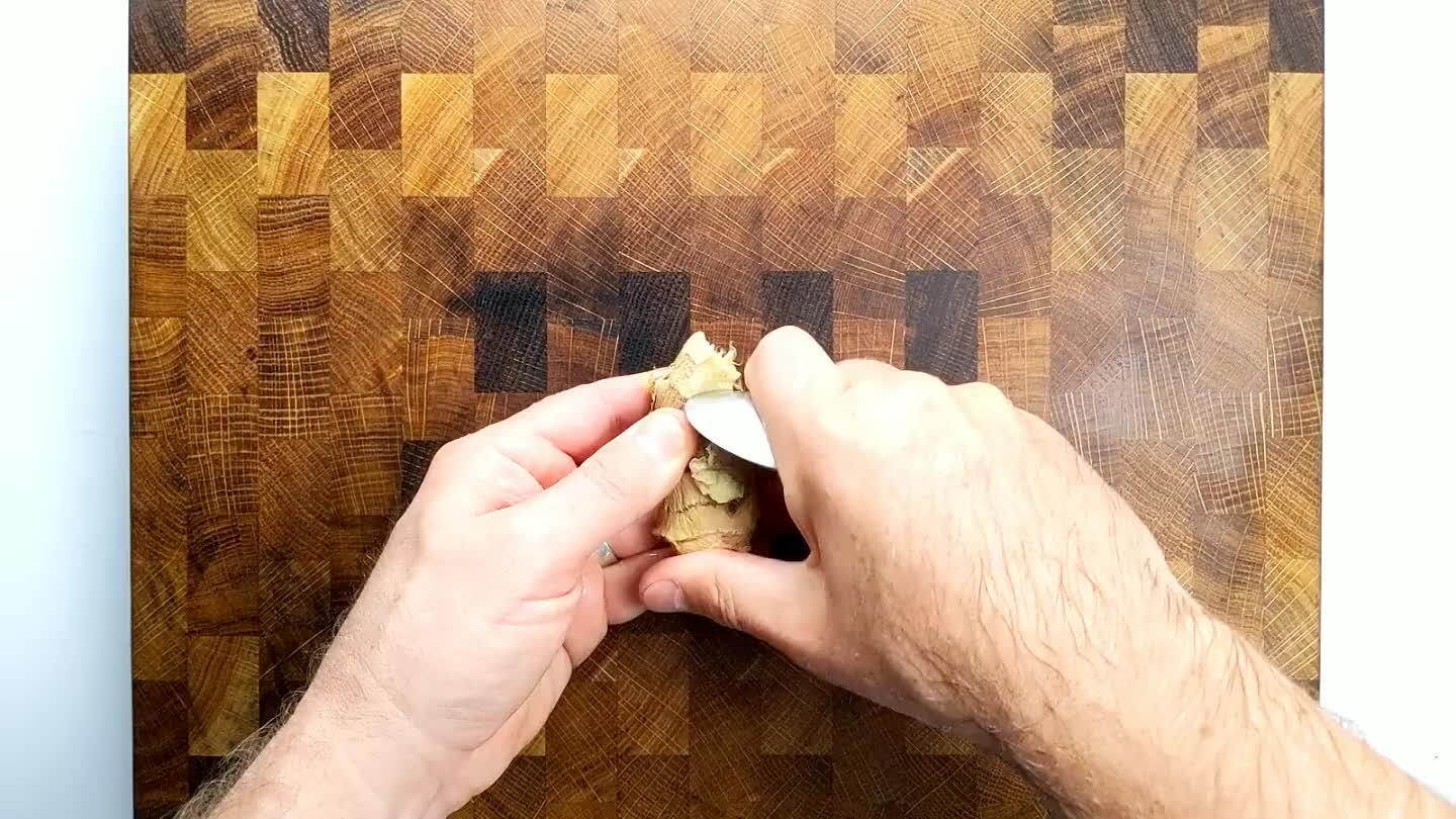 ng into those hard to reach places when removing ginger skin. Slice the peeled ginger as thin as you can. Layer those slices and then slice again as thin as possible into tiny strips.