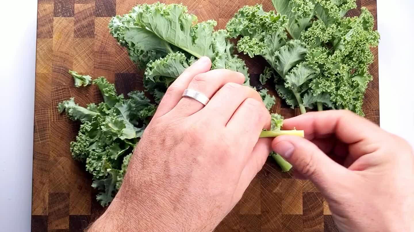 nd dragging it through with the other. Roll up the leaves together and slice.
