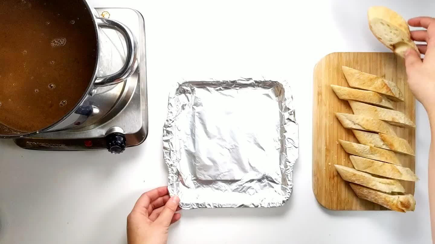 pan with foil (to make cleanup easier), and pile on a few tablespoons of gruyere, and about another tablespoon of parmesan per slice. It is ok if the cheese is overflowing a bit, this just makes nice crispy cheese edges.