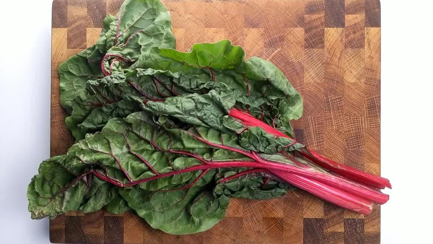 from the stem. Roll up the leaves and slice into strips, around 1/2" in width.
