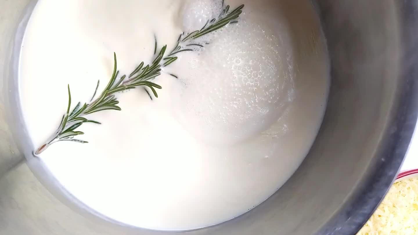 mmer for a few minutes. Remove the rosemary and remove the cream from heat.