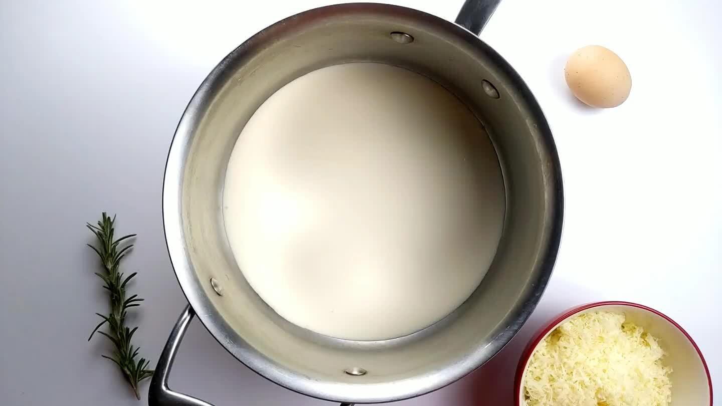 mmer for a few minutes. Remove the rosemary and remove the cream from heat.