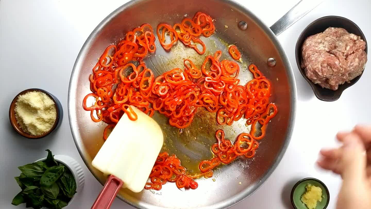 s. Stir over medium heat until the peppers start to brown slightly and get tender.