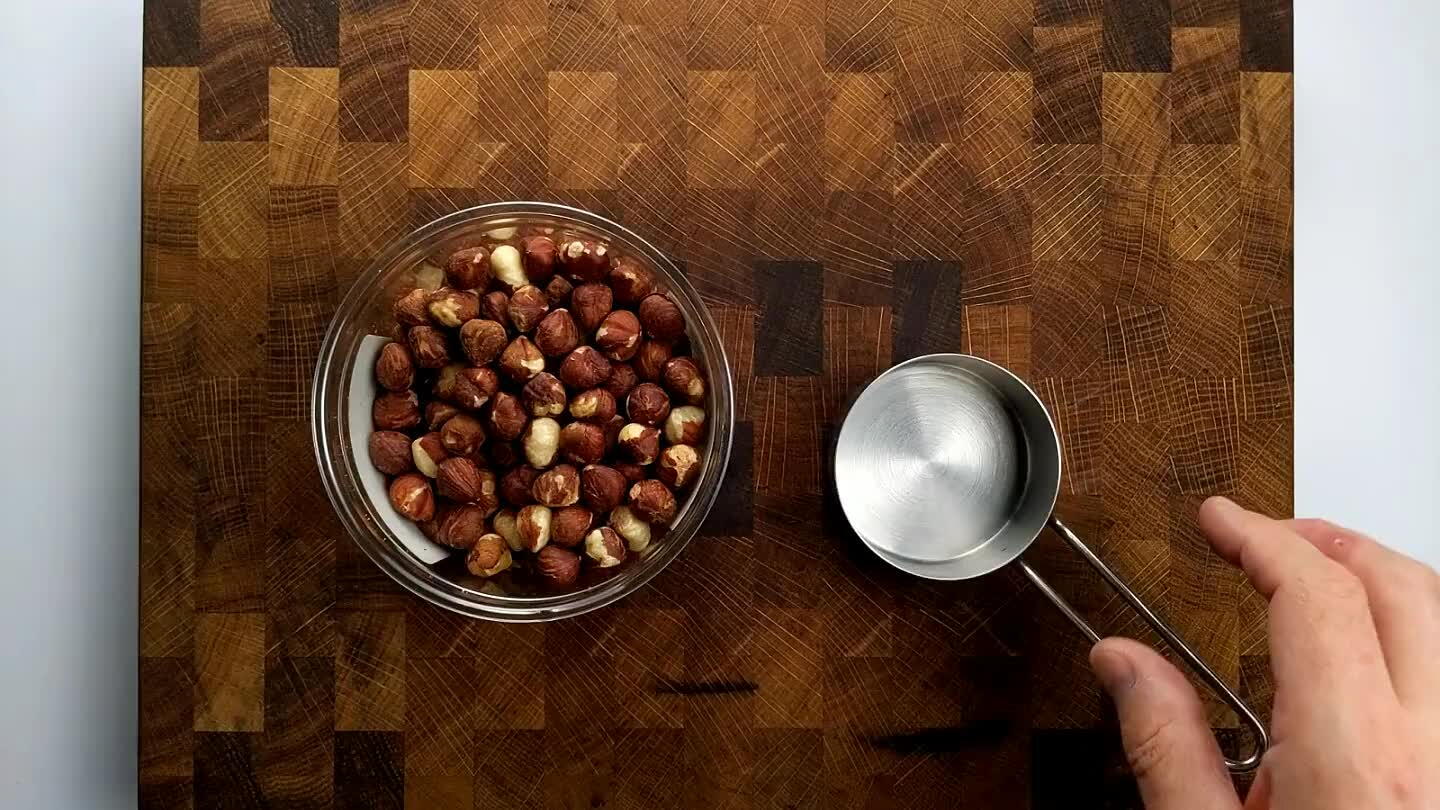 hly. A large pan works pretty well for this. Or you can toss them in a plastic bag and pound them with a meat tenderizer. You don't want to crush the nuts to a powder, just break them into smaller chunks.