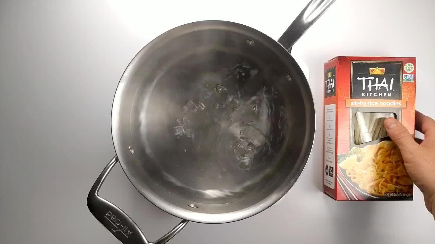 the variety of rice noodle. Generally you bring a pot of water to a rolling boil, then remove from heat and add the noodles. Let them sit until tender (10-15 minutes). Then strain and rinse with cold water. It's important to rinse the noodles to remove some of the excess starch.