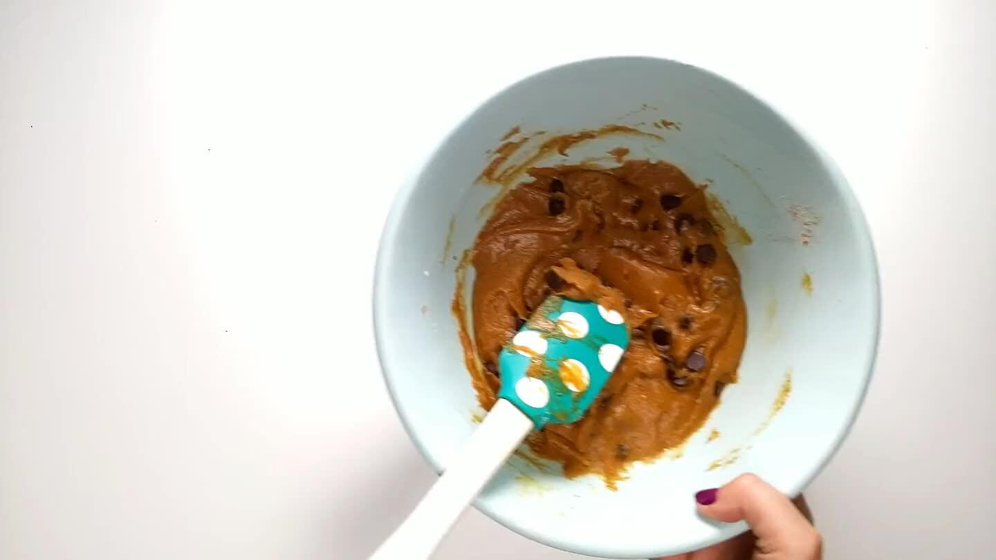 balls of dough. I like to use a small ice cream scoop which makes this process very quick and easy. Roll the dough between your hands and flatten slightly. Leave a couple inches between the cookies.