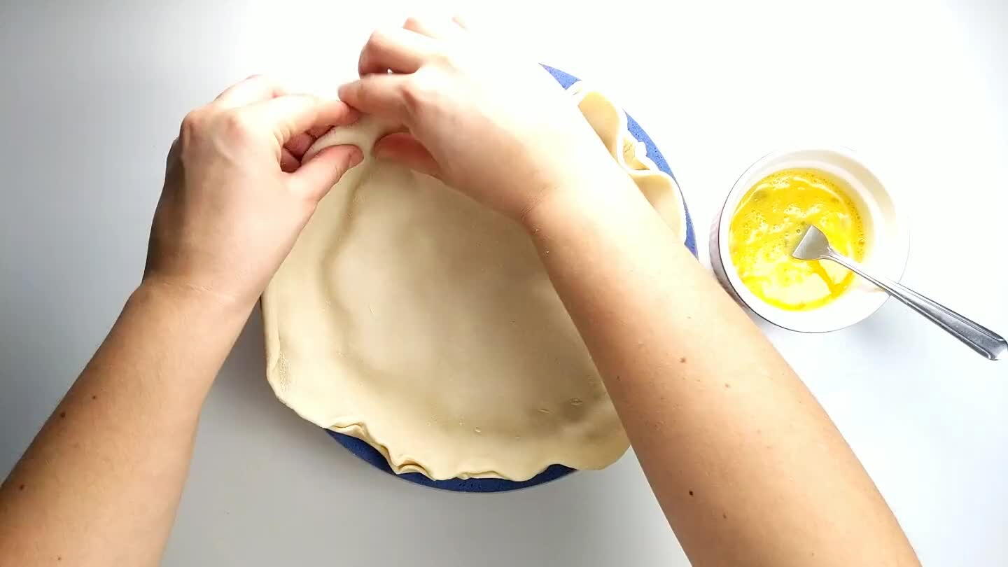 ce you have an even rim around the outside and the dough is sealed together, use your favorite crimping method. Here I used three fingers to create a wavy pattern. A fork works well also to make a pattern around the edge.