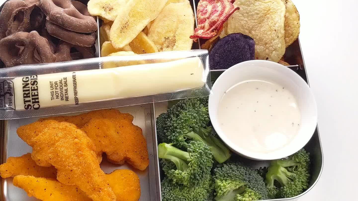 pretzels, veggie chips, and banana chips. Pack the string cheese on the side.