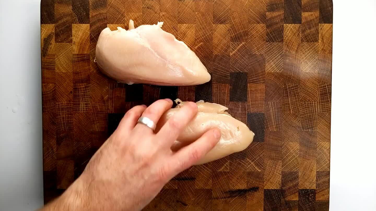 ap hanging underneath. The tender has a tendon running through it that's chewy. You want to get rid of that. Find the bright white strip and scrape at it with the tip of your knife to pull it out of the tender.