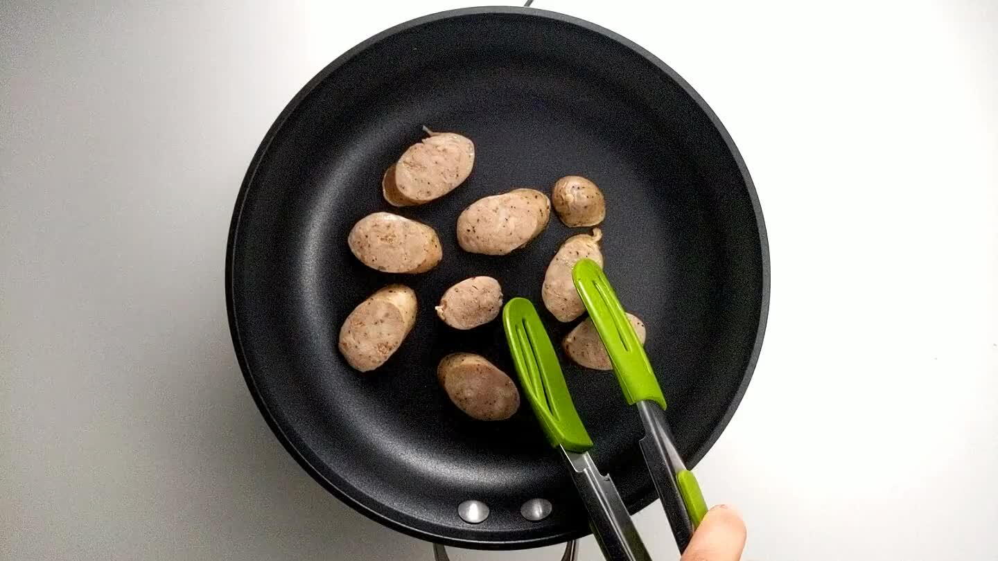 ispy and brown. Add the sausage to the lunch box.