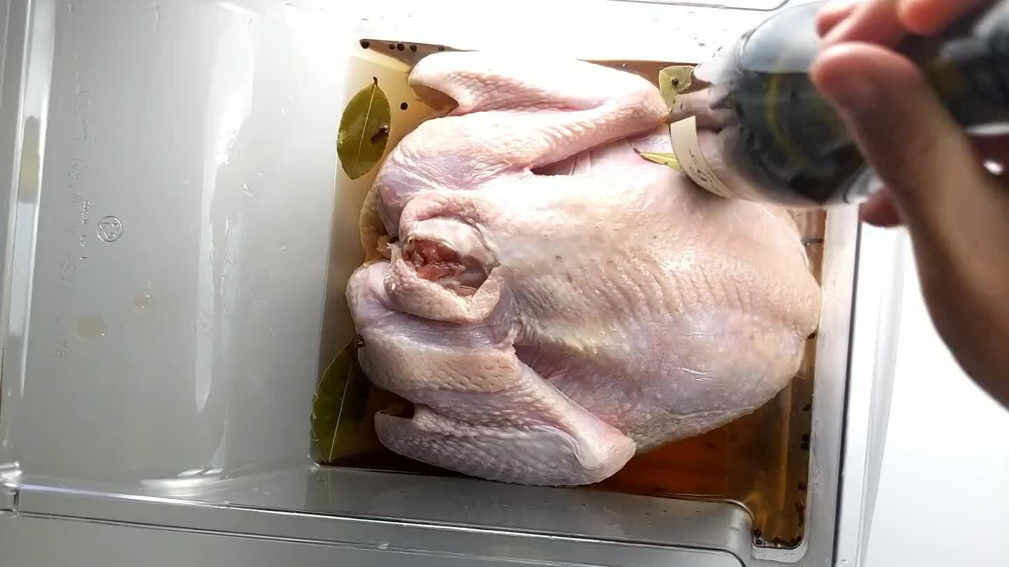 ottle with water and slide it into the brine so that it displaces enough brine to submerge the turkey.