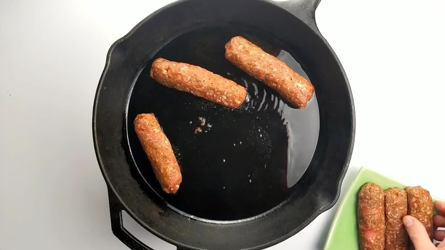 rtions to the hot oil. Cook until well-browned on one side.