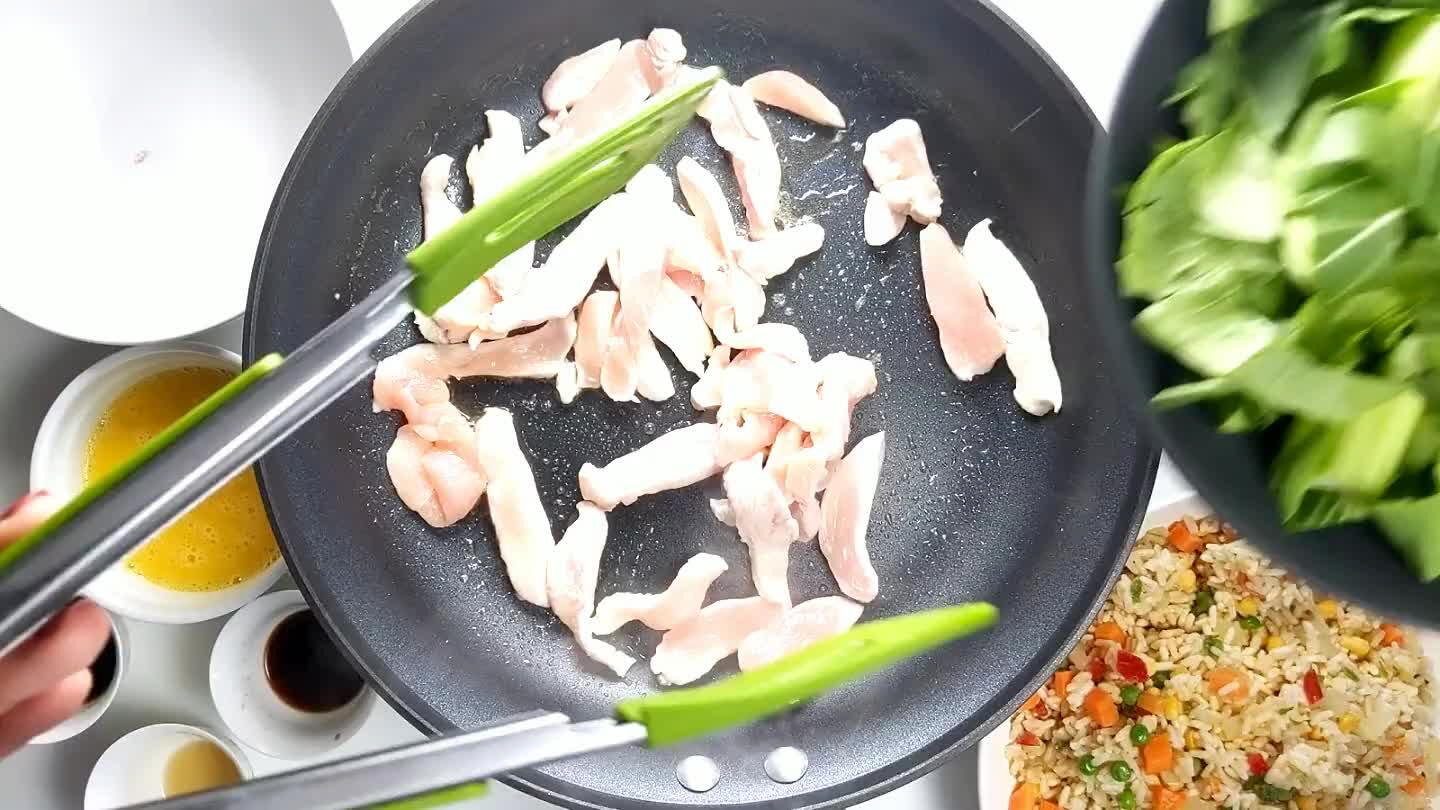 cooked. Make a space in the pan and pour in the scrambled egg. Stir until cooked.
