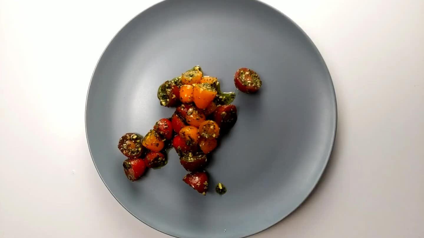 n. Add the tomato salad underneath or over the top as a relish. I do recommend eating everything together. The brightness of the tomatoes and pesto go well with the rich, but dry polenta and the fat and flavor of the salmon.