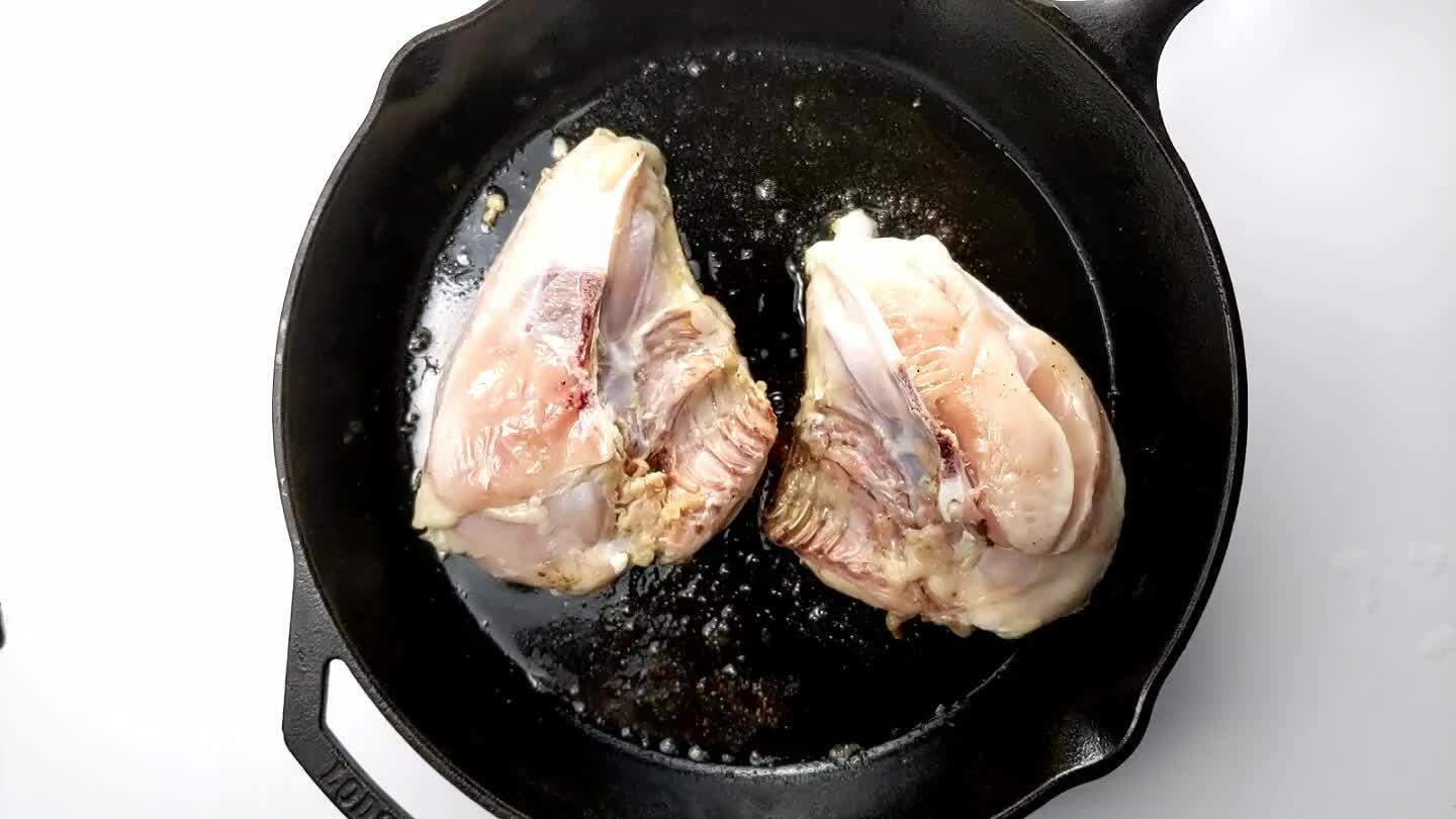 ntly release the skin from the pan with a thin steel spatula. Flip it over to cook the opposite side until done. Internal temperature should be about 165°F. Check the internal temperature at the thickest part of the breast.