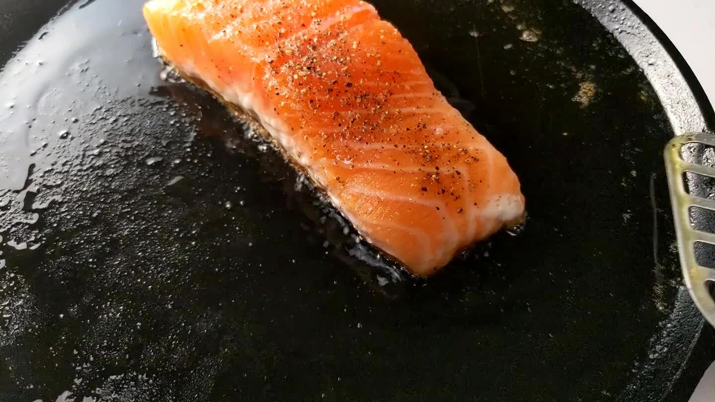 with a thin steel spatula and flip the fillet over to cook the opposite side. Cook until the sides change from a light translucent orange to an opaque pink. Depending on how thick your fillet is, you may need to keep it cooking. FDA recommends 145°F internal temperature.