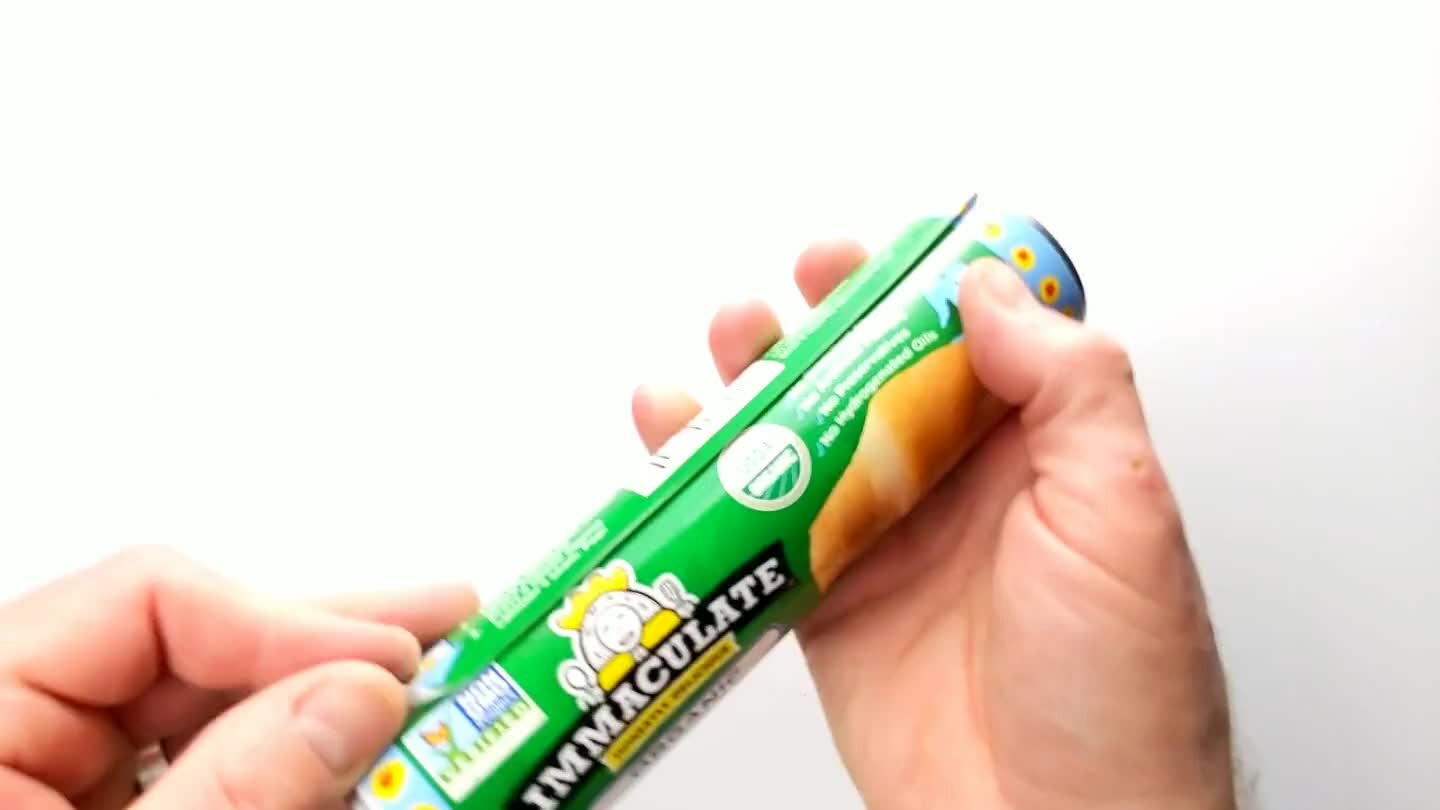 tip of the spoon into the tube as indicated on the tube.