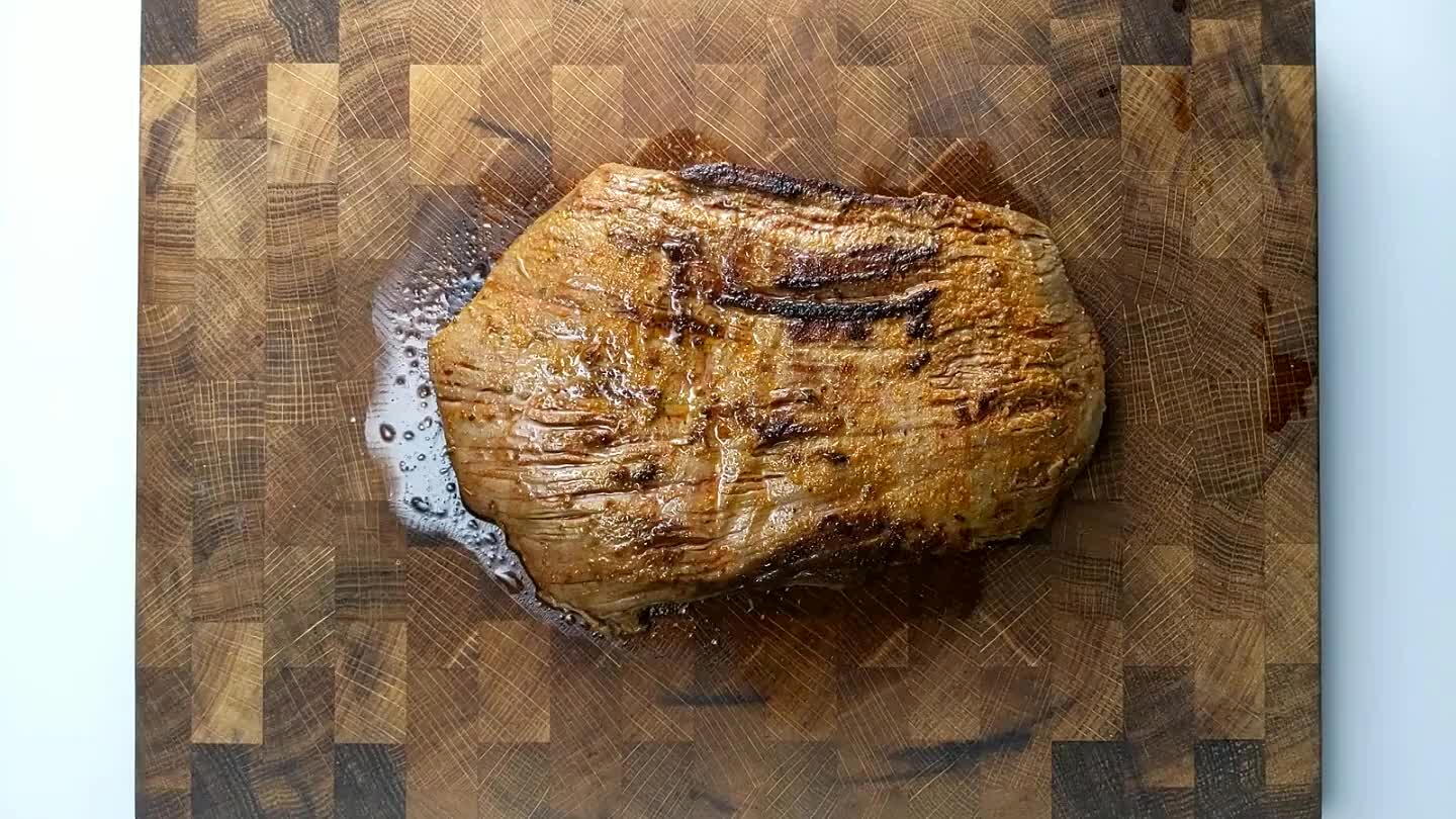 perature throughout. Flank steak is fairly thin, so it should be cooked to medium by the time you get some color on it and let it rest. It's also a little on the tough side, so slice thin, and against the grain.