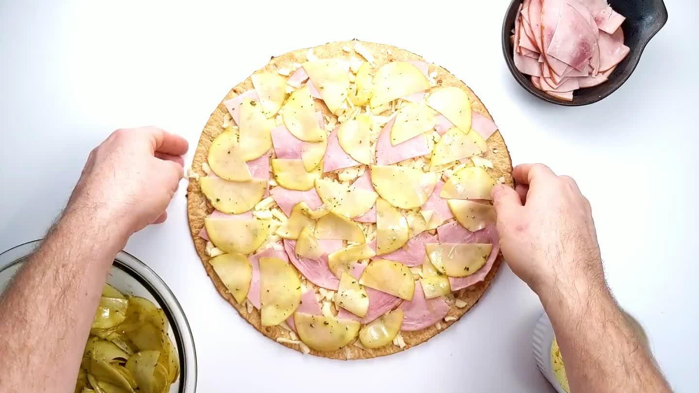 to slices don't overlap. Overlapped potatoes will cook slowly and it's already a challenge here to get the potato slices cooked before the pizza crust burns.