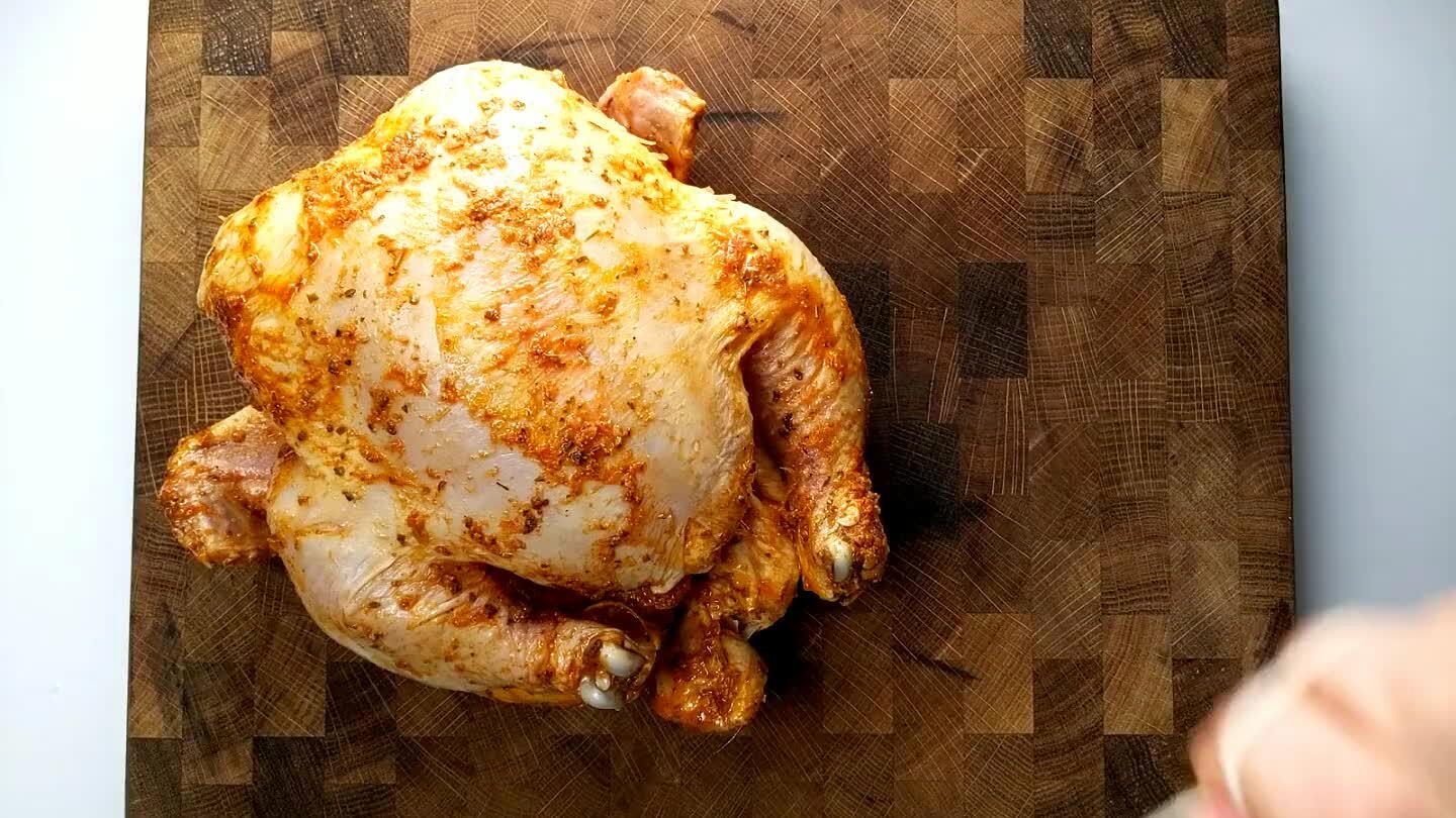 crevice between the thighs and breast, down under and around the outside of the ankles, and cinch it tight to pin the legs together under the tip of the breast.