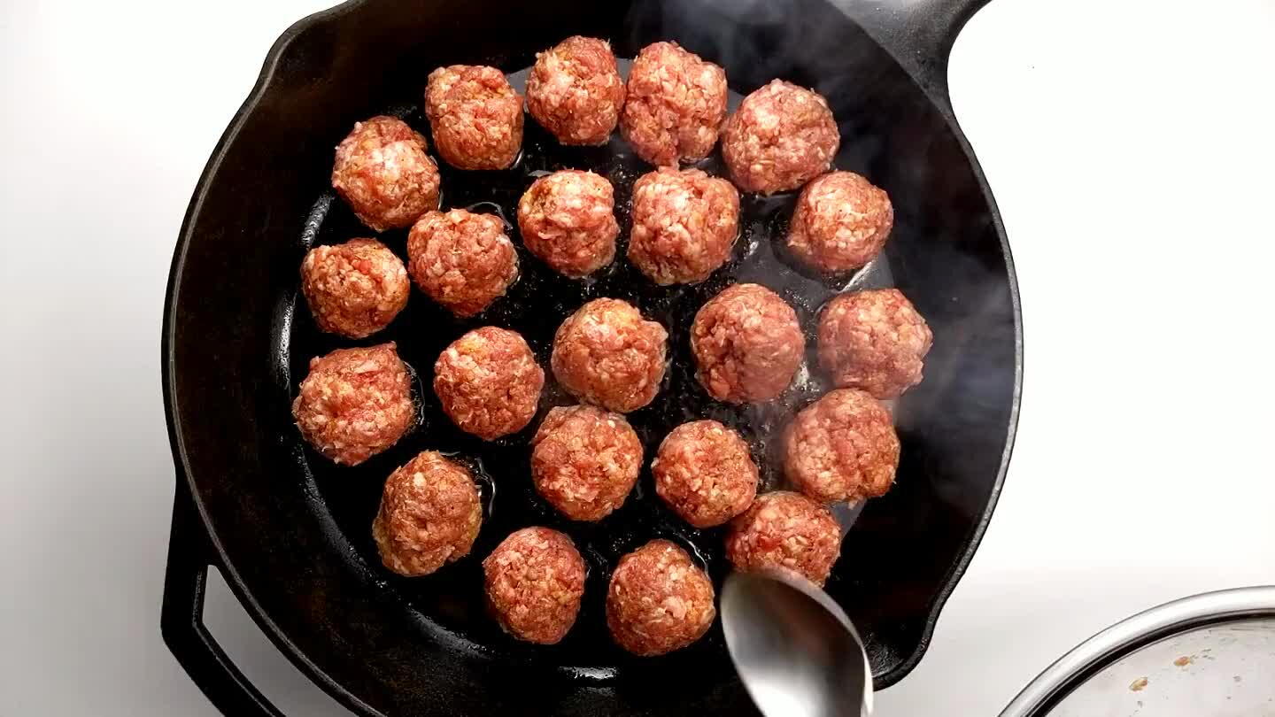 ides, transferring them to a bowl as they finish. Add the remaining uncooked meatballs to the pan as the cooked meatballs are removed.