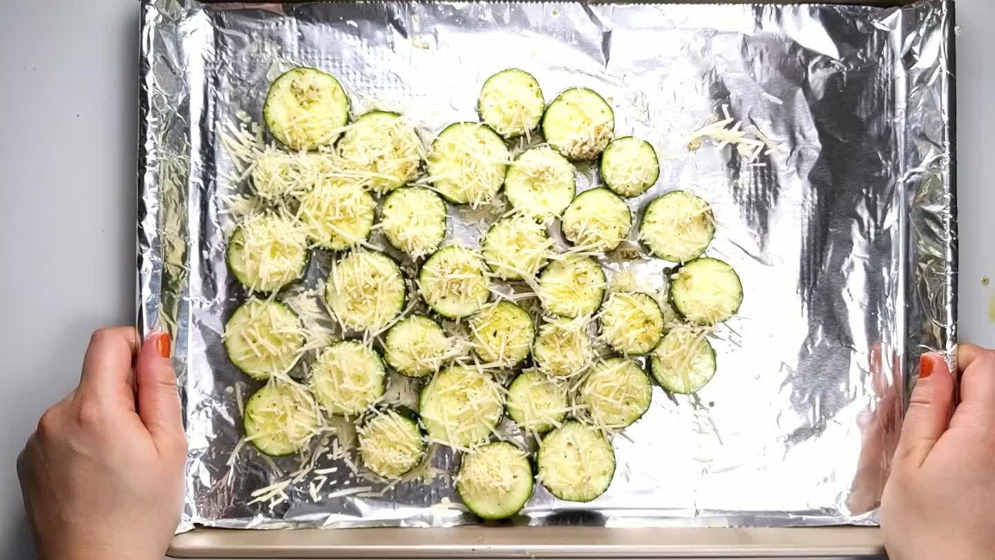commend just putting the salmon in 3 minutes after the zucchini. If your salmon is still frozen, you may need to bake it a tad longer.