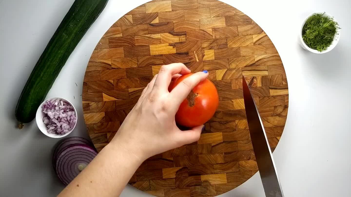 from the stem to the base of the orange.