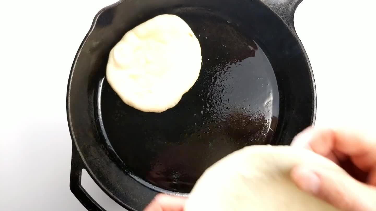 ts. If you plan to bake, place a sheet tray or a pizza stone in the oven and preheat to 425°F. Place a round of dough directly on the stone for 4 minutes. To fry, heat a small amount of oil in a heavy pan and fry until golden brown on both sides. Frying adds more color, but baking is easier and will result in a puffier pita that's much easier to open and fill.