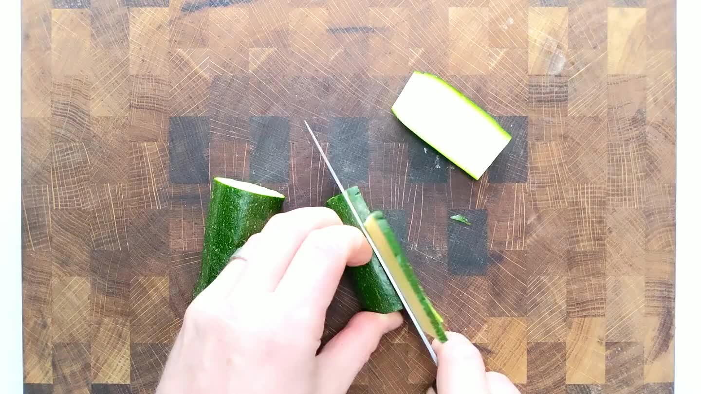 le. Slice into sheets, less than 1/4" thick. Stack those sheets and slice again less than 1/4" thick to form thin strips. Group the strips and cut to a fine dice.