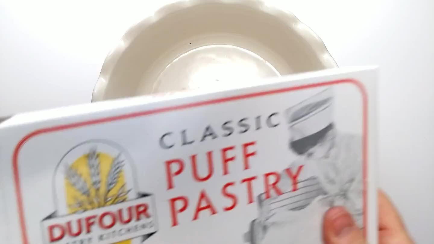 ch it gently up the edges of the dish. Trim away the pastry that hangs over the rim.