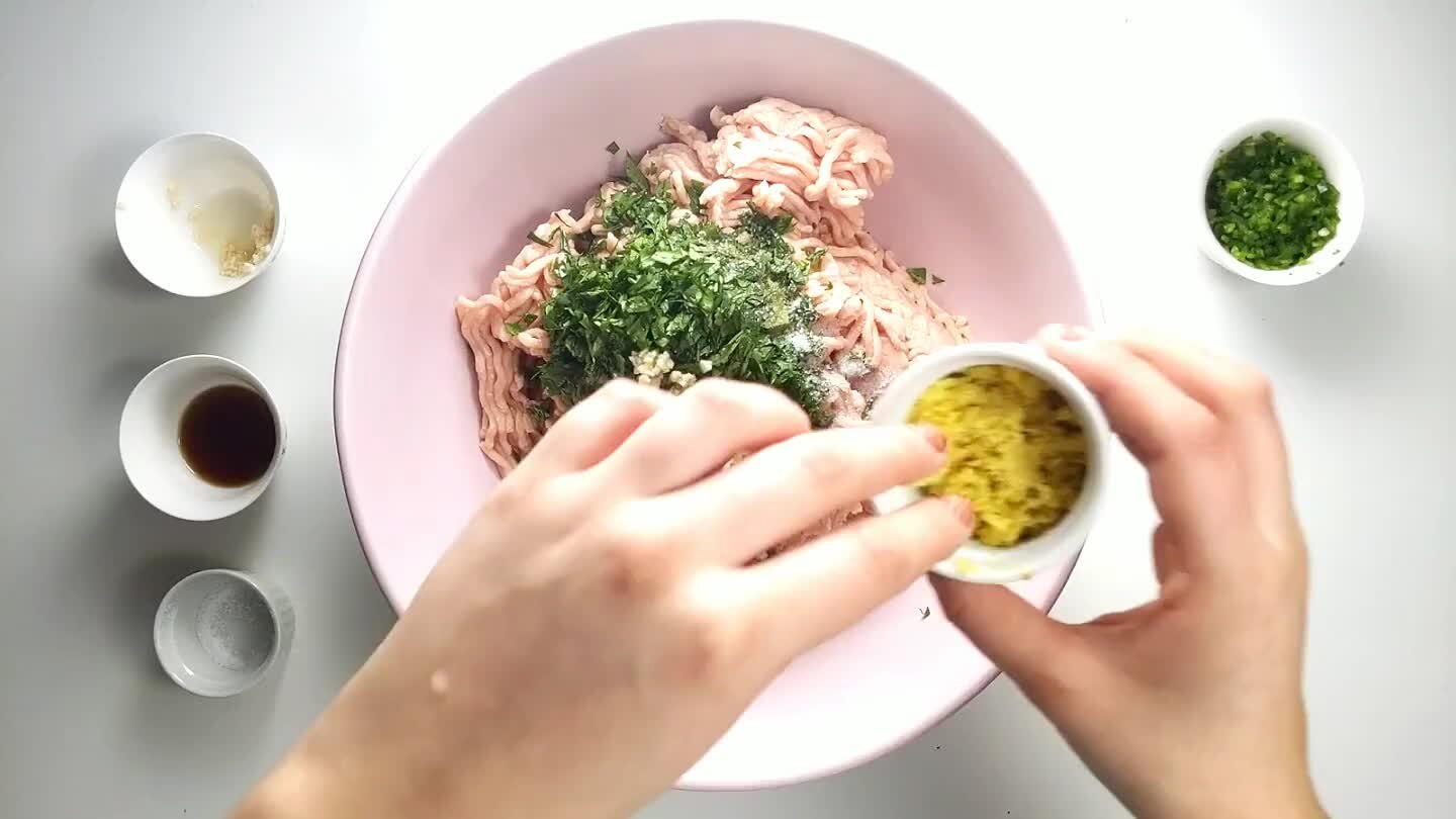 and fish sauce to the ground chicken in a large bowl.