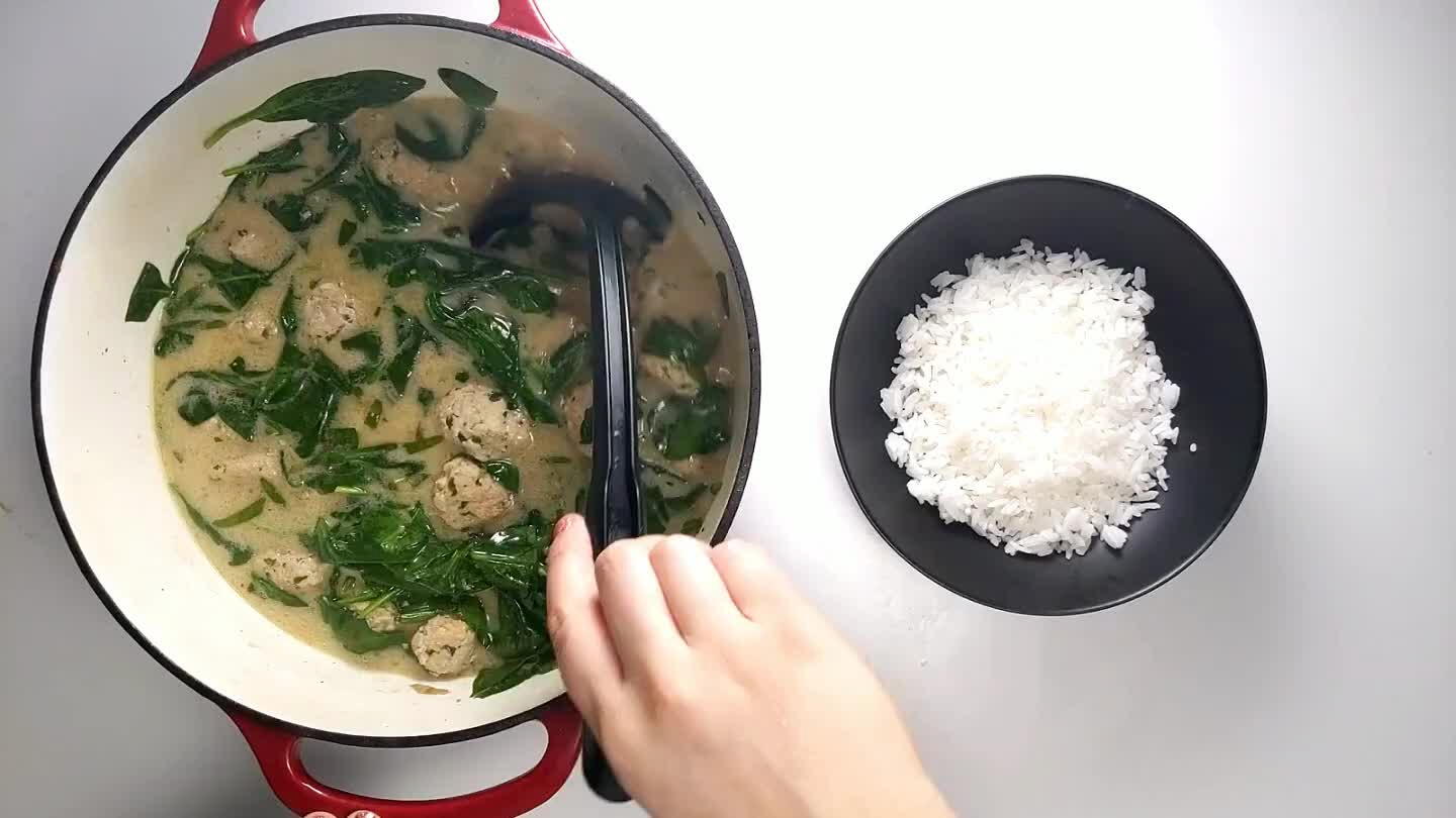 stirring the spinach into the soup. Cut the other half of the lime into wedges for serving.