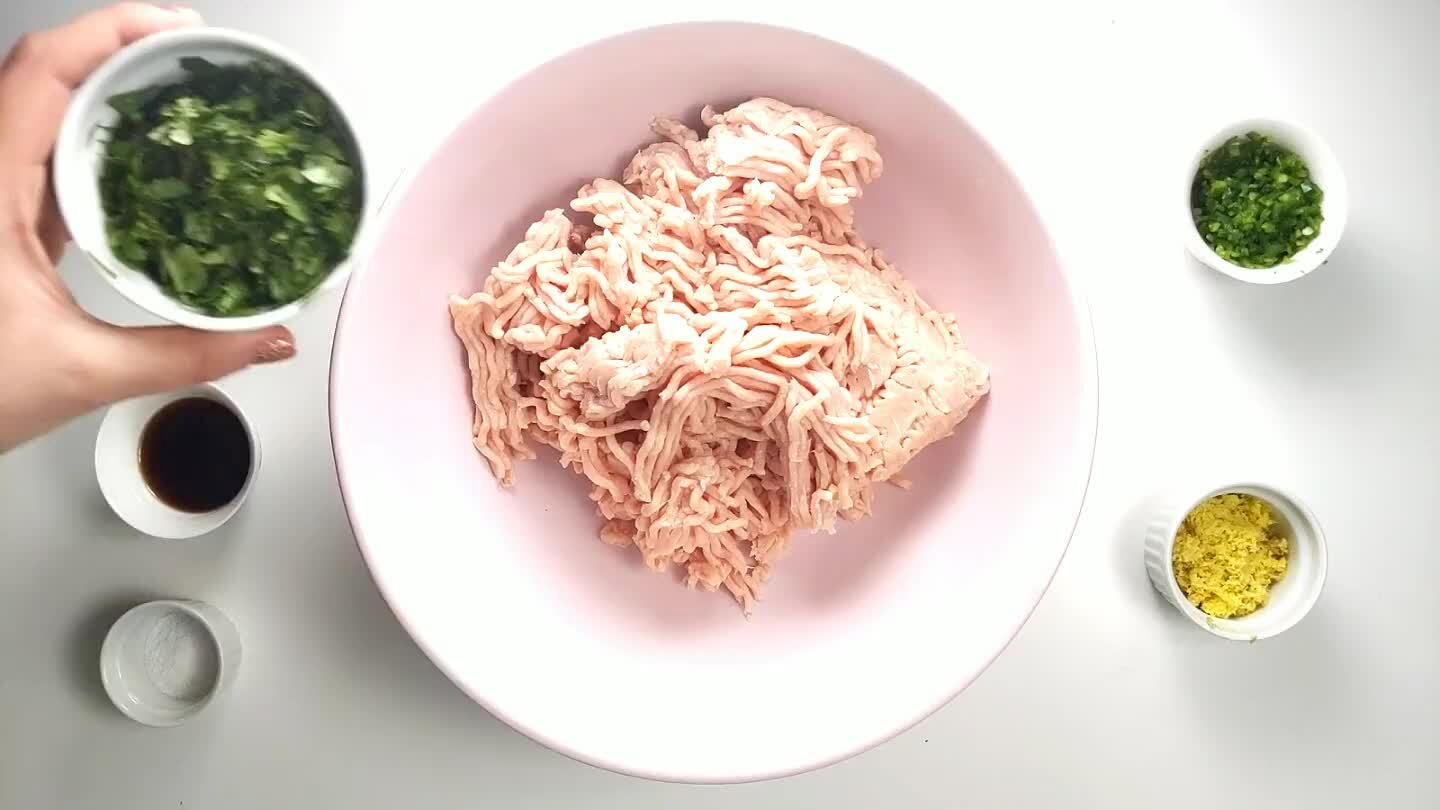 and fish sauce to the ground chicken in a large bowl.